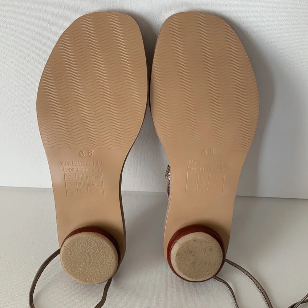 Silvia Cobos Santos Wrap around the ankle flat sandals